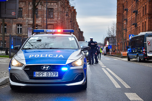 Policyjna eskorta biorąca udział w zabezpieczeniu spotkania &quot;Bukaresztańskiej Dziewiątki&quot;