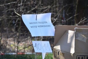 Kartka z napisem miejsce oględzin.