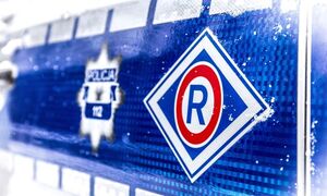 Logo Policja na radiowozie.