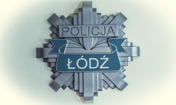 Na zajawce widzimy szarą gwiazdę z napisem Policja, po środku jest napis Łódź na niebieskim tle