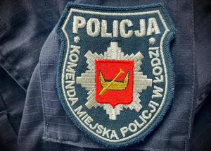 Naszywka Komendy Miejskiej Policji w Łodzi na rękawie munduru.