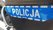 napis policja na baku motocyklisty