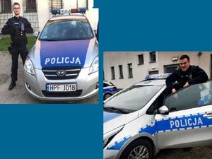 policjanci stoją przy radiowozach