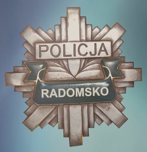 Odznaka policyjna z napisem RADOMSKO.