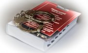 na książce - Kodeks karny leżą policyjne kajdanki