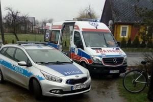 radiowóz policji oraz karetka pogotowia