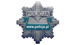 Obraz przedstawia emblemat odznaki policyjnej z napisami Policja oraz www.policja.pl